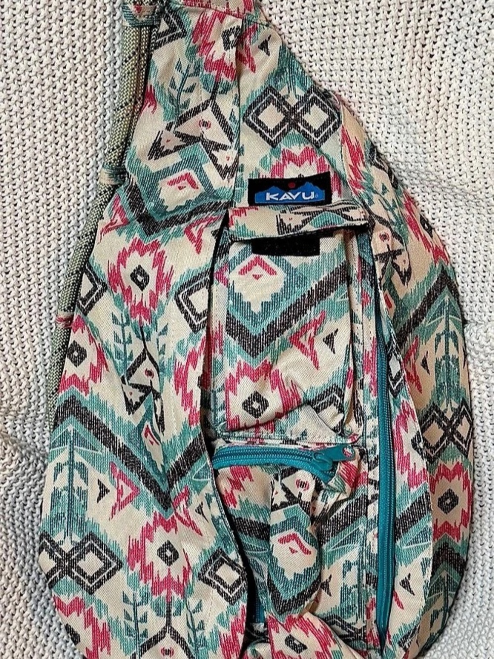 Kavu Rope Bag Geometric Sling Backpack in Green & Pink